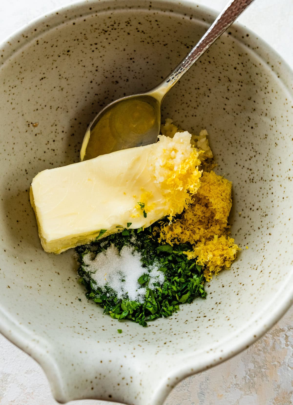 How to make the herb butter for the grilled filet mignon.