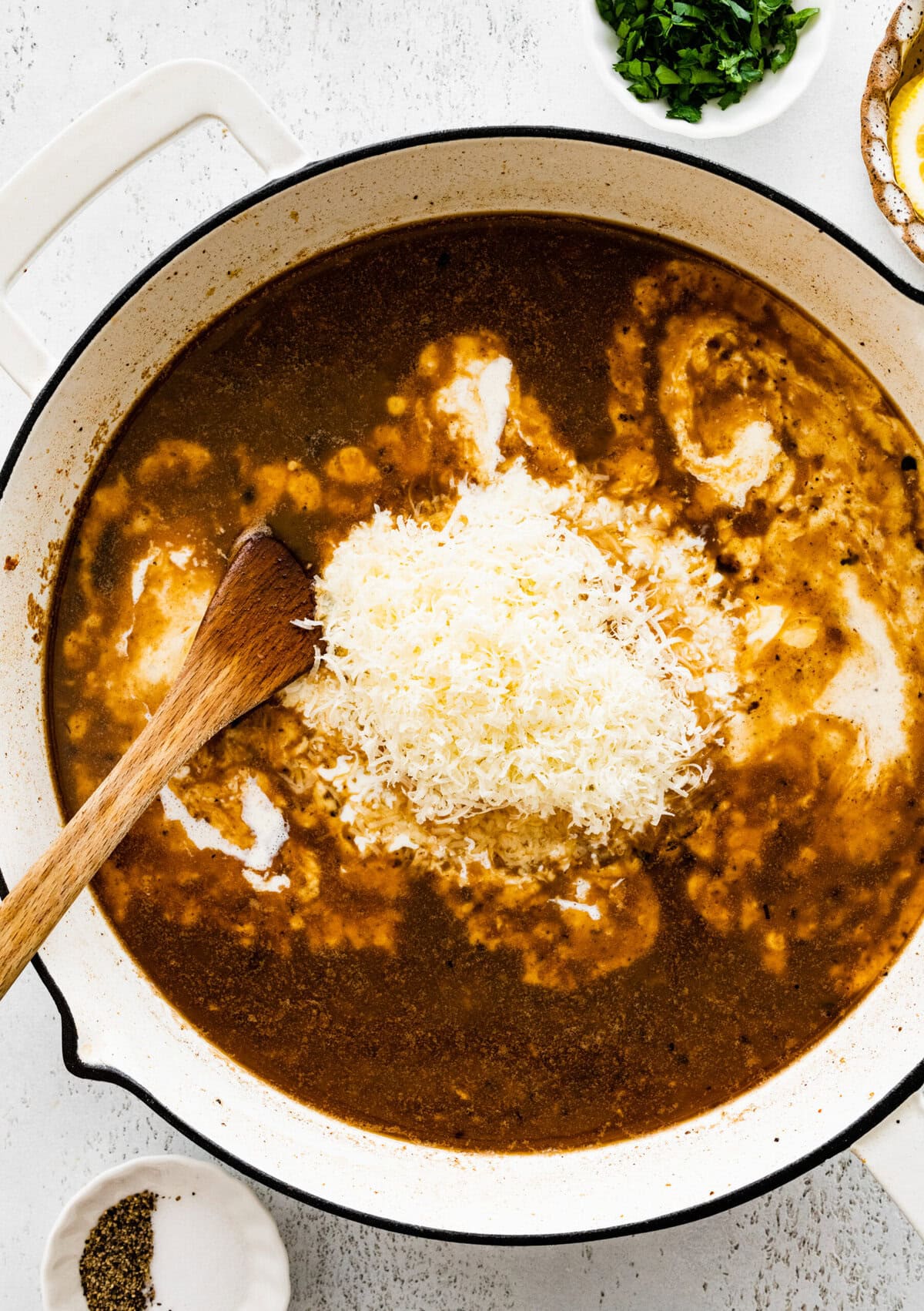 Add the parmesan cheese to the sauce and stir.