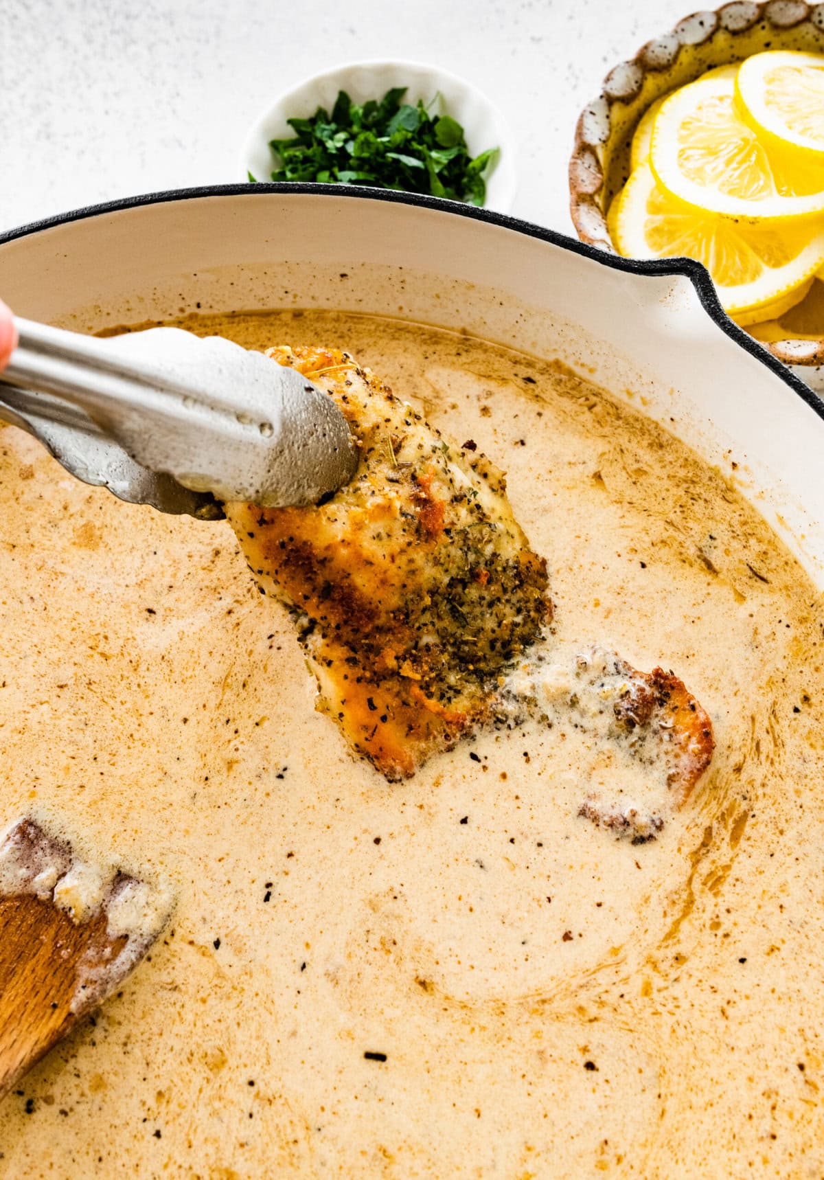 Place the chicken back in the pan with the lemon cream sauce.