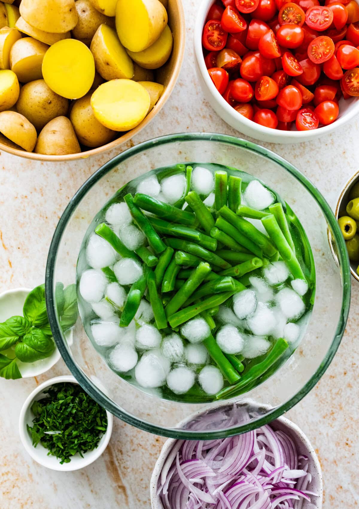 how to make Italian potato salad recipe: green beans in ice water after boiling.