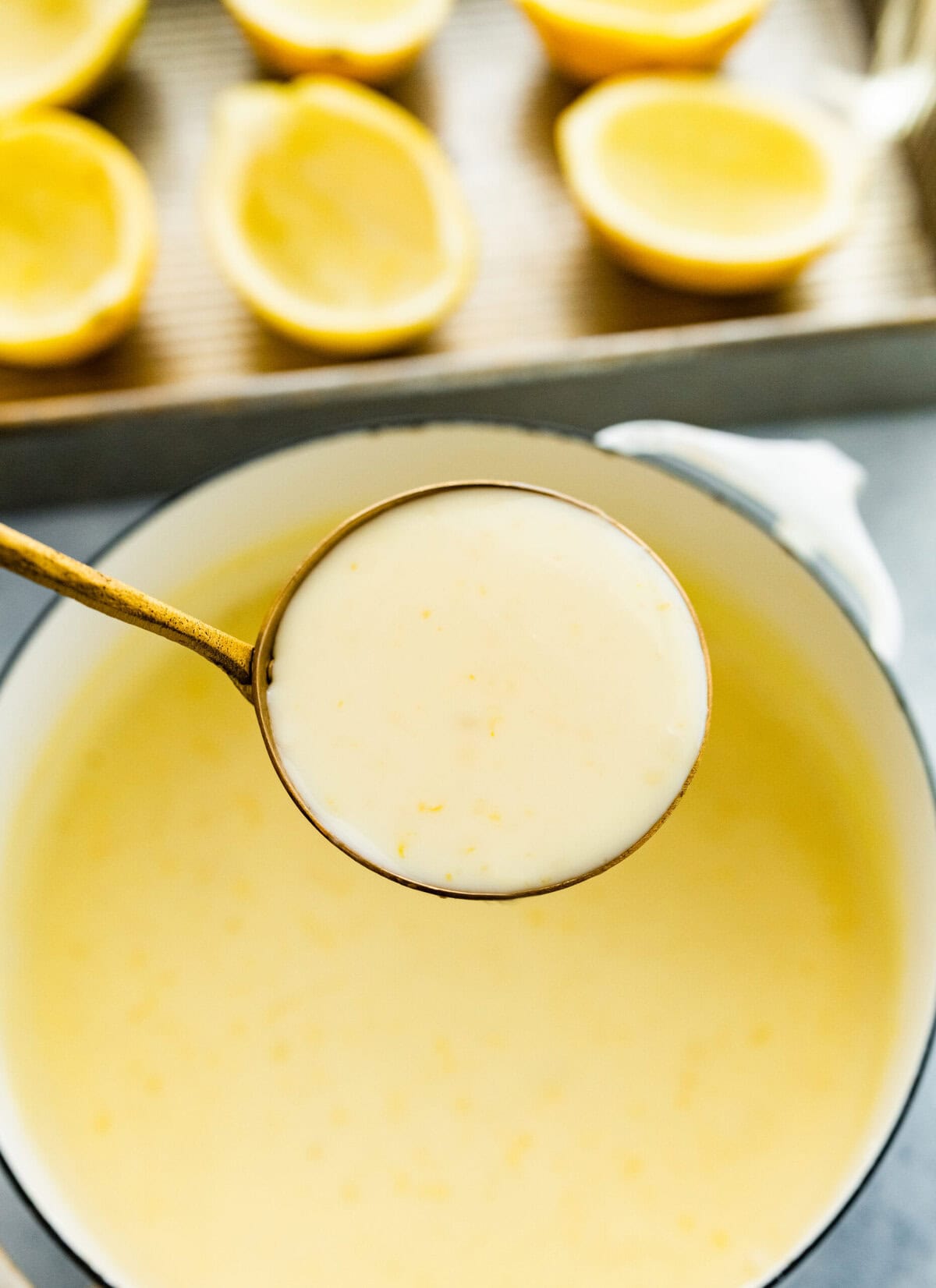 pour the lemon posset mixture into ramekins or lemon halves.