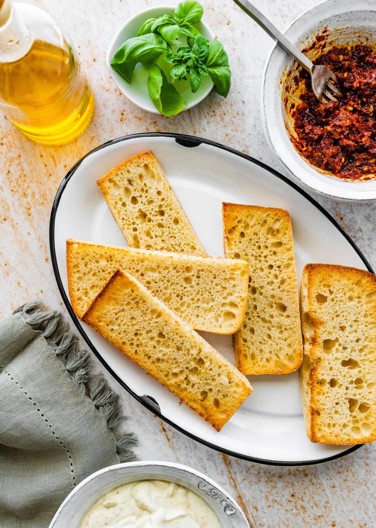 toasted ciabatta bread on a plate.