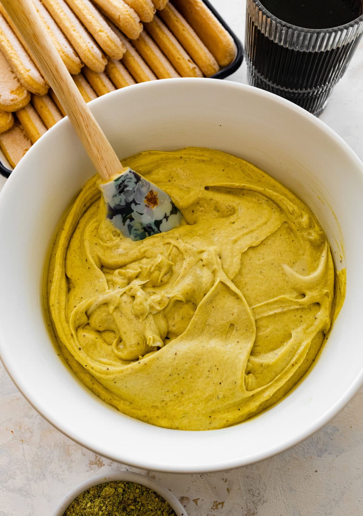creamy pistachio mascarpone filling mixture in a bowl.