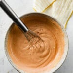 burger sauce in a bowl with a whisk.