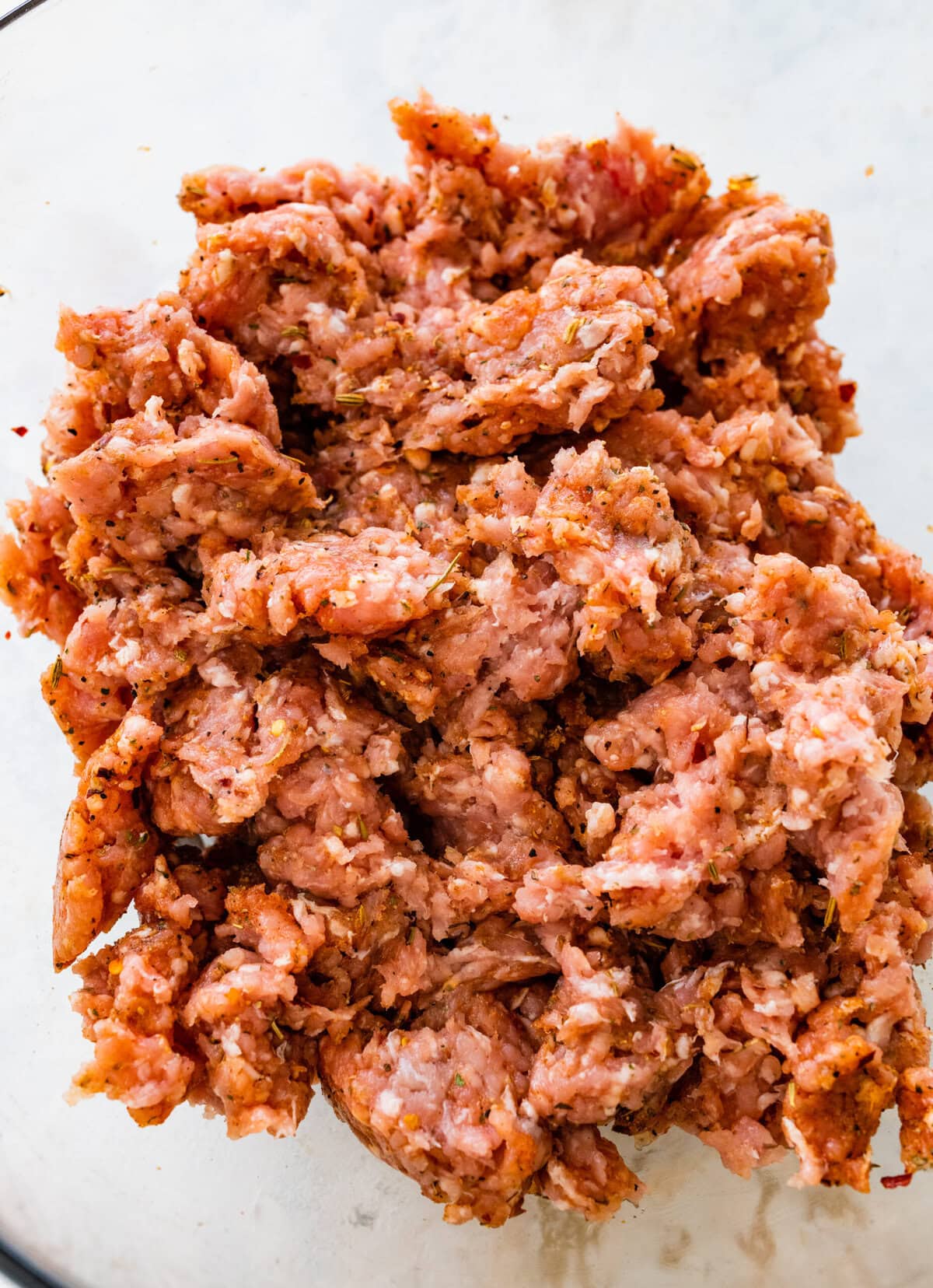 Italian sausage mixed with the sausage seasoning to combine.