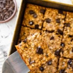 Banana chocolate chip oatmeal bars. One bar on the spatula.