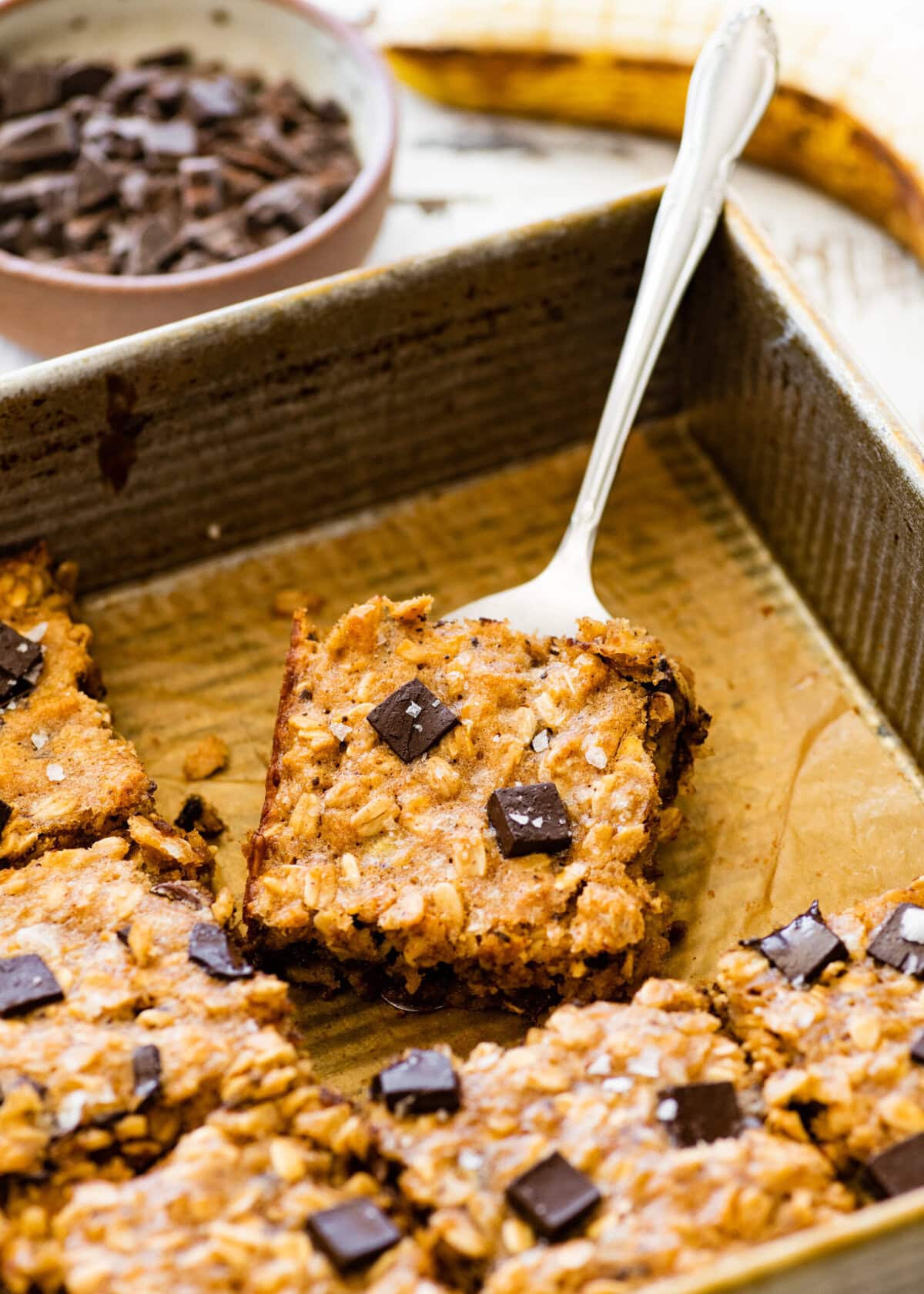 A pan filled with oatmeal chocolate banana bars.