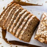 sourdough rye bread recipe after baking it on cooling rack. Slices taken out of the bread.
