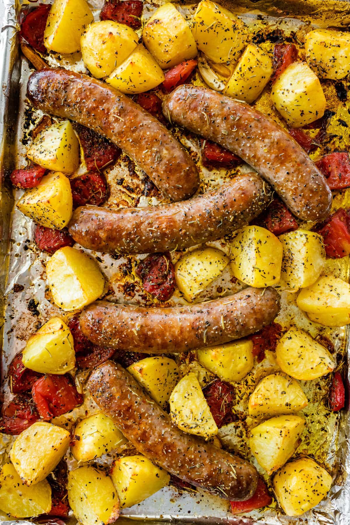 Sausage sheet pan dinner after it's baked in the oven.