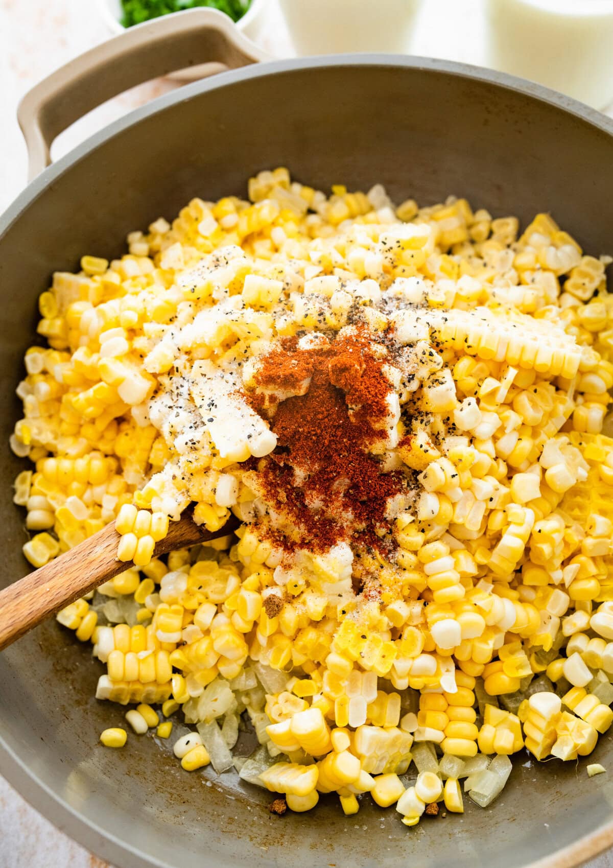 fresh corn to pan with onions and spices.