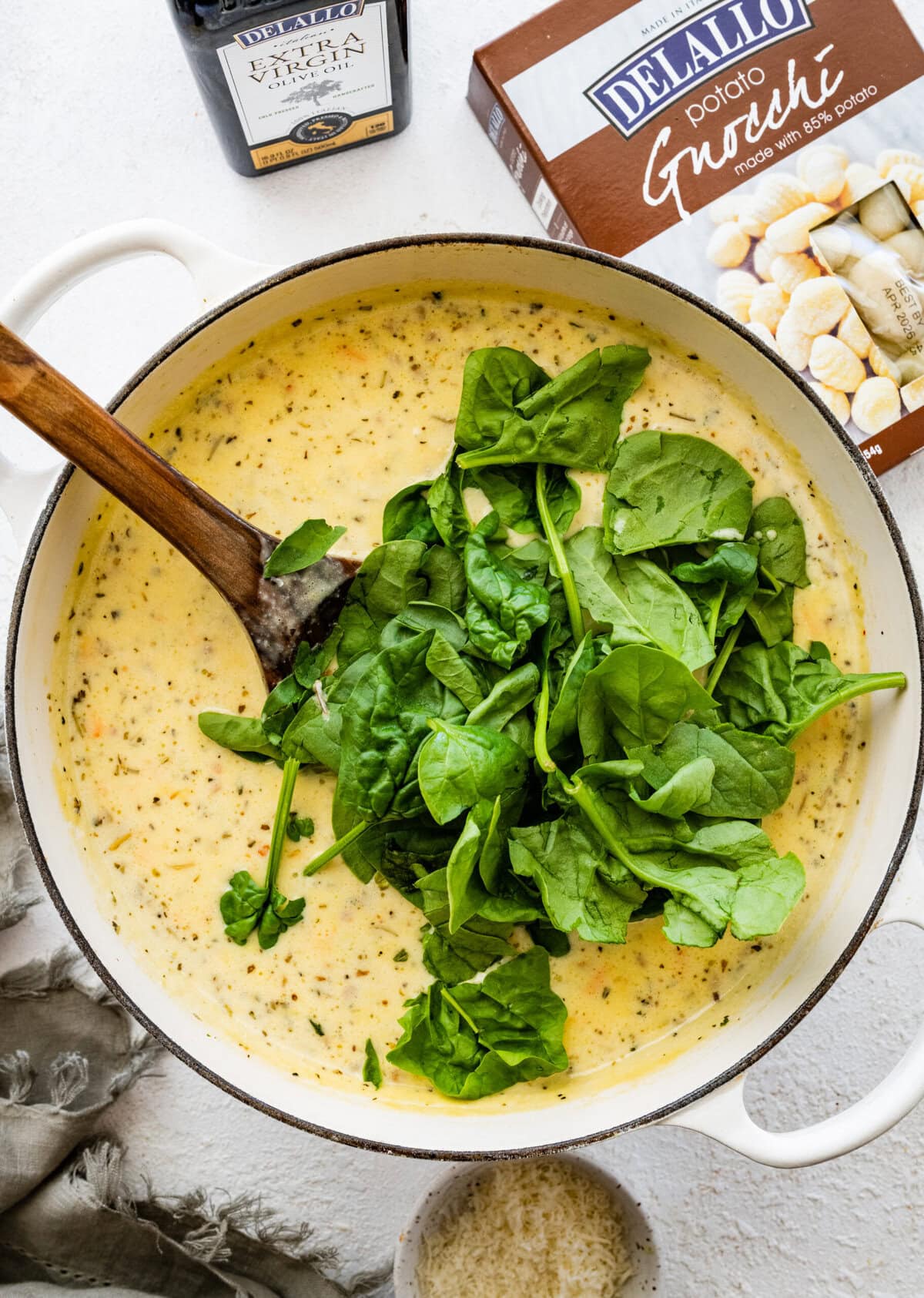 fresh spinach cooking in the gnocchi soup.