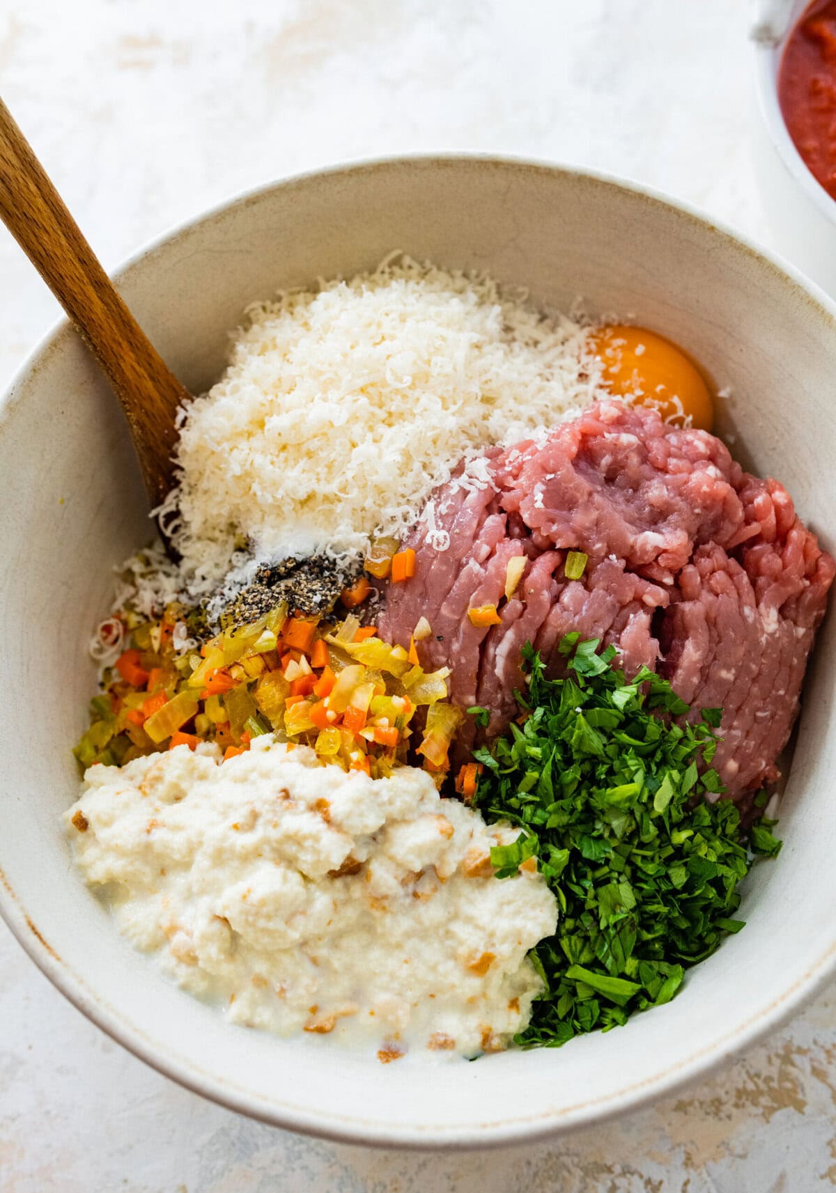all ingredients for Italian meatloaf in a bowl.