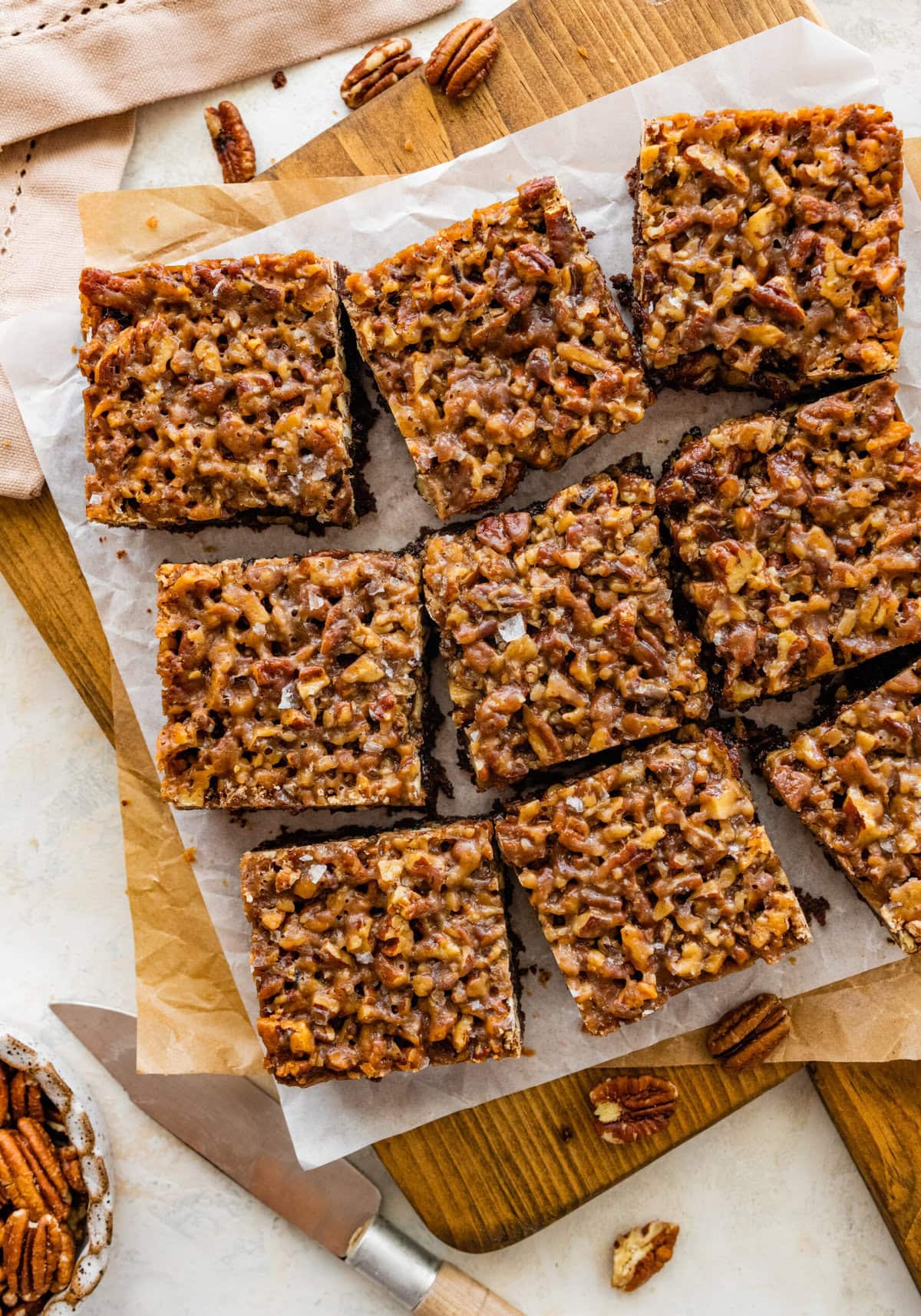 pecan pie brownies cut into squares ready to eat.