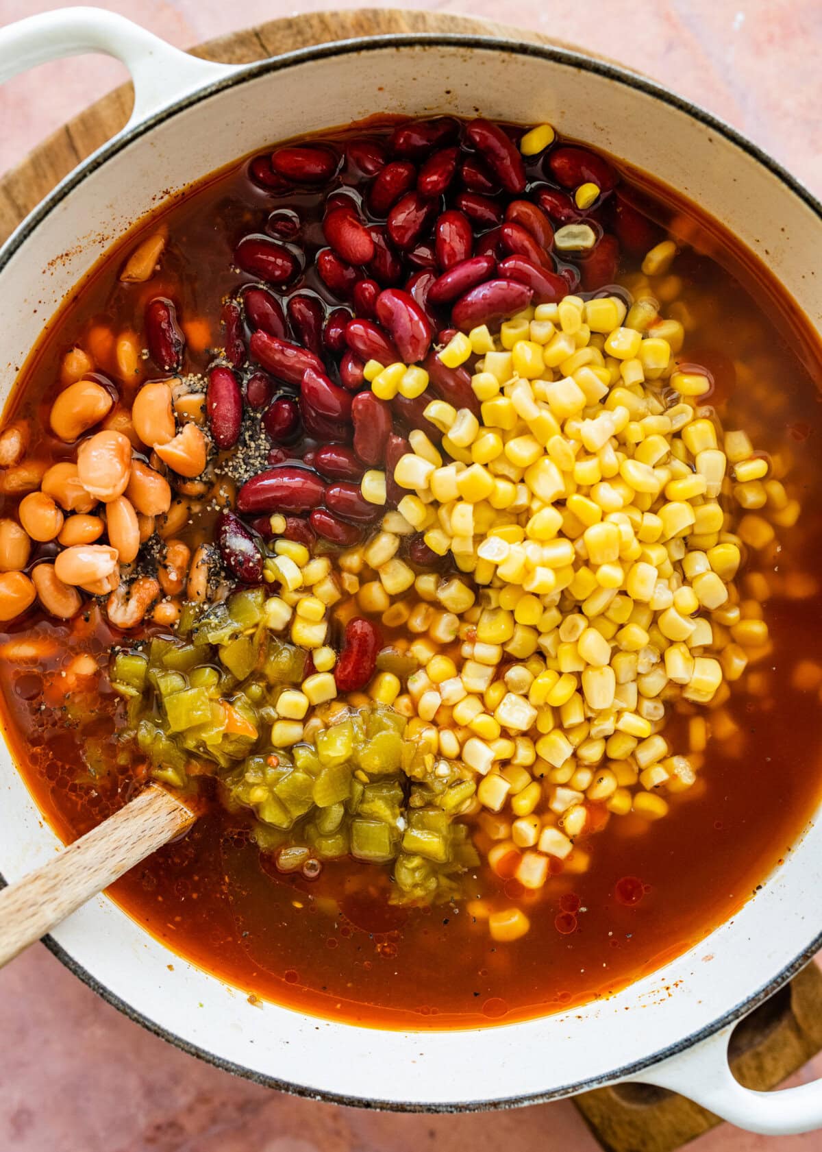 all taco soup ingredients in pot ready to cook.