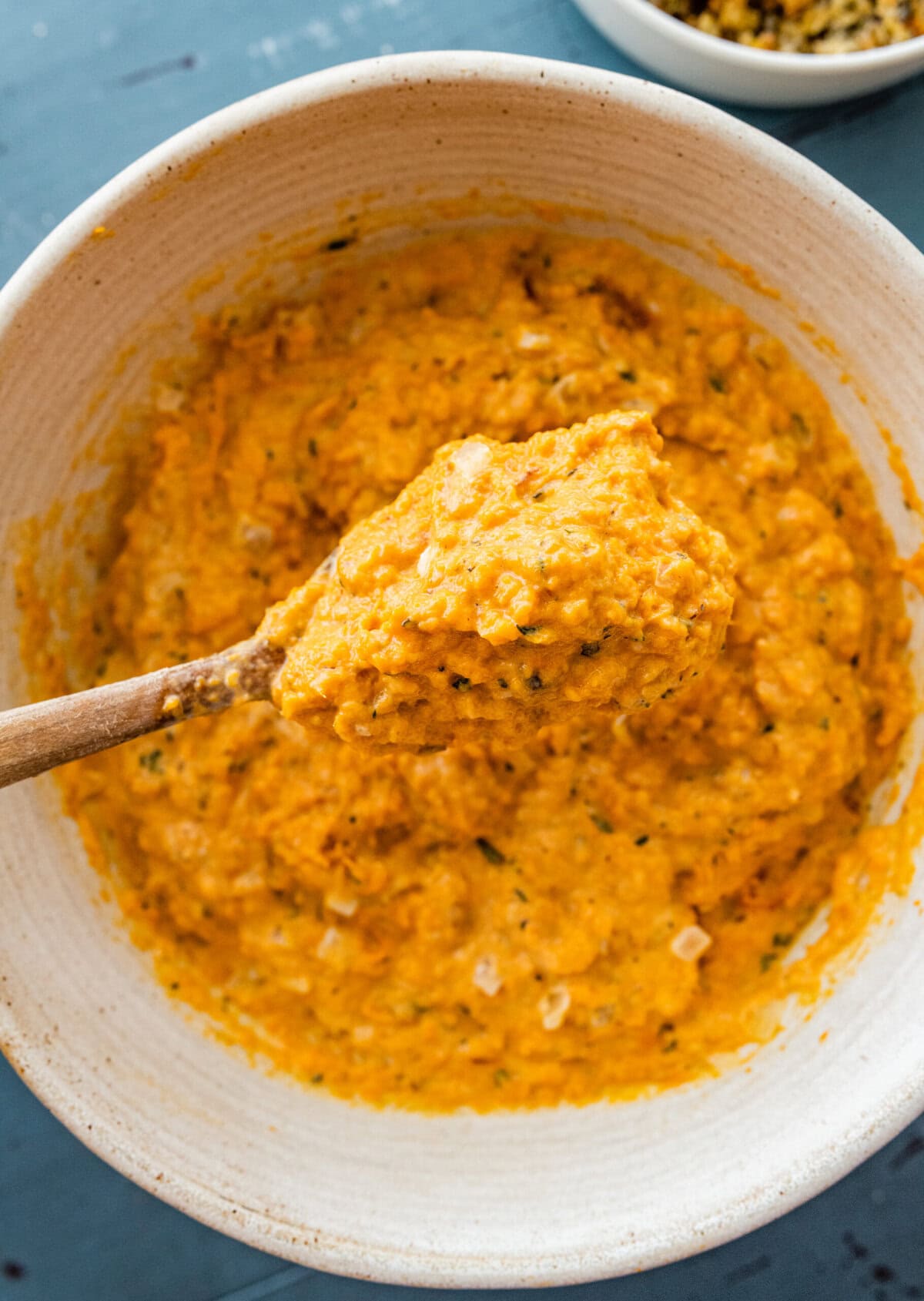 savory sweet potatoes mashed in a bowl.