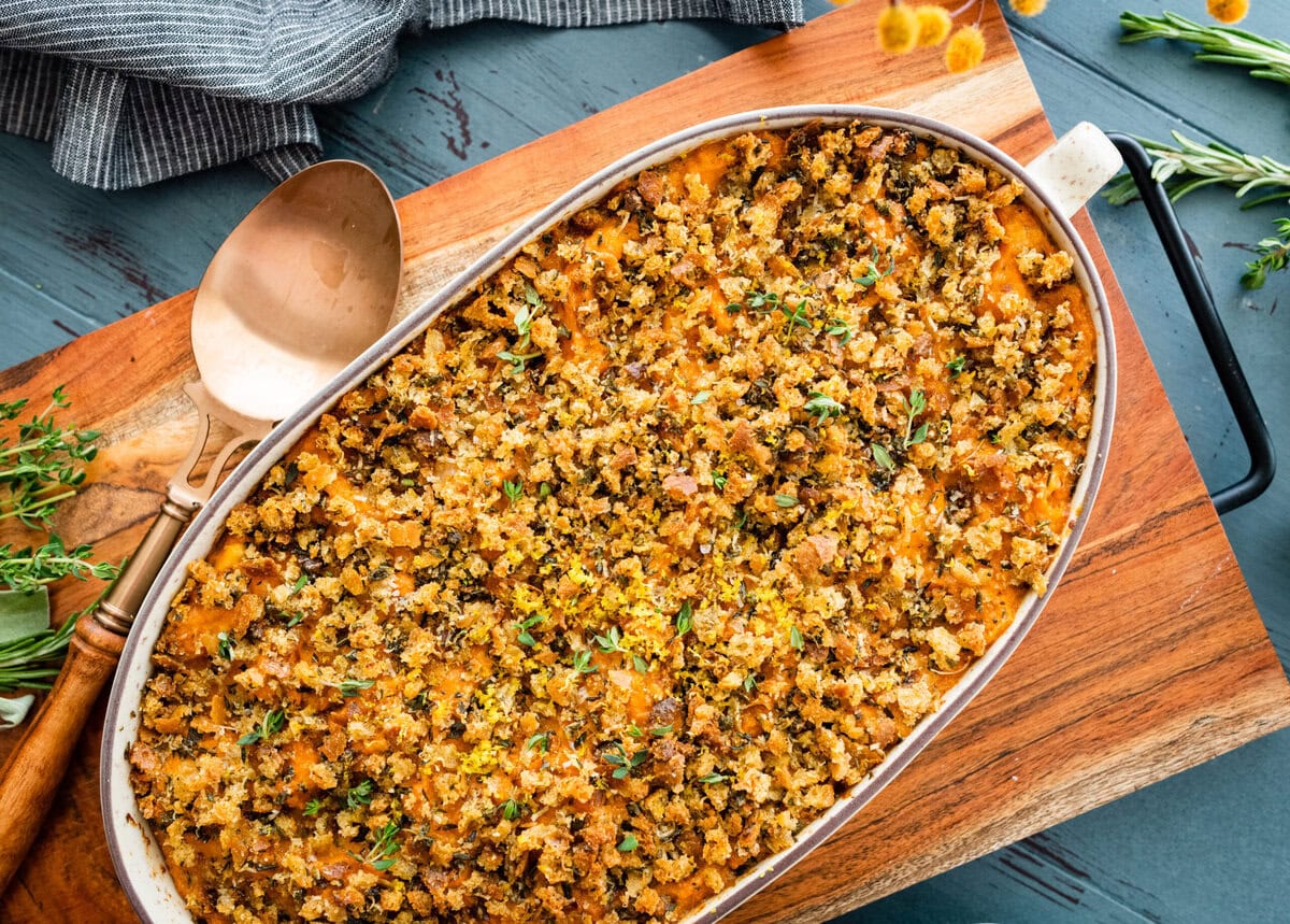 savory sweet potato casserole in an oval baking dish.