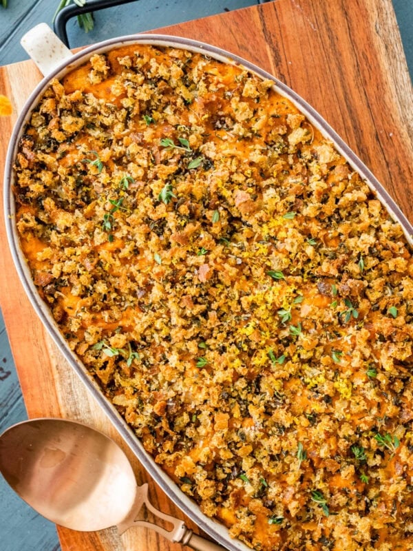 savory sweet potato casserole in an oval baking dish.