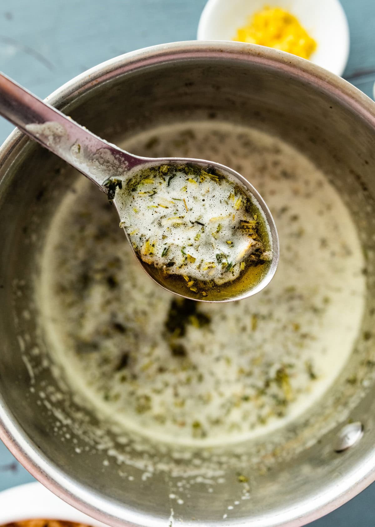 melted herb brown butter in a pan for making savory sweet potato casserole.