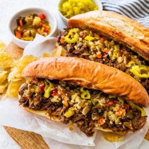 Italian beef recipe made into sandwiches on toasted buns with cheese.