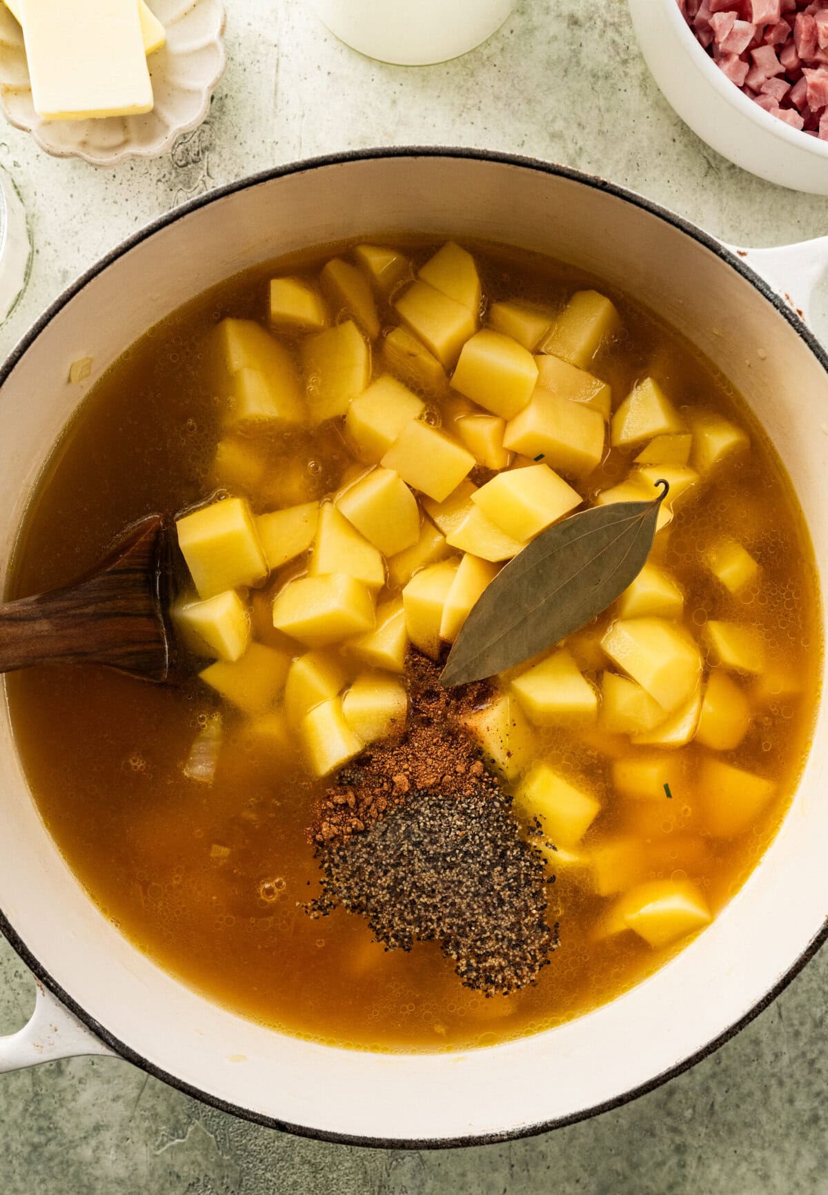 Seasoning in pot for the ham and potato soup recipe.