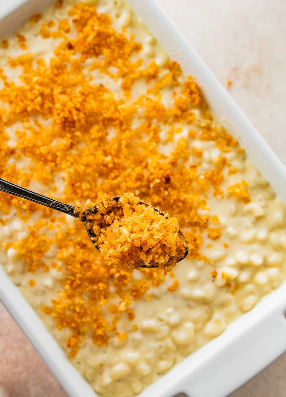 sprinkle the crunchy topping on the homemade mac and cheese.