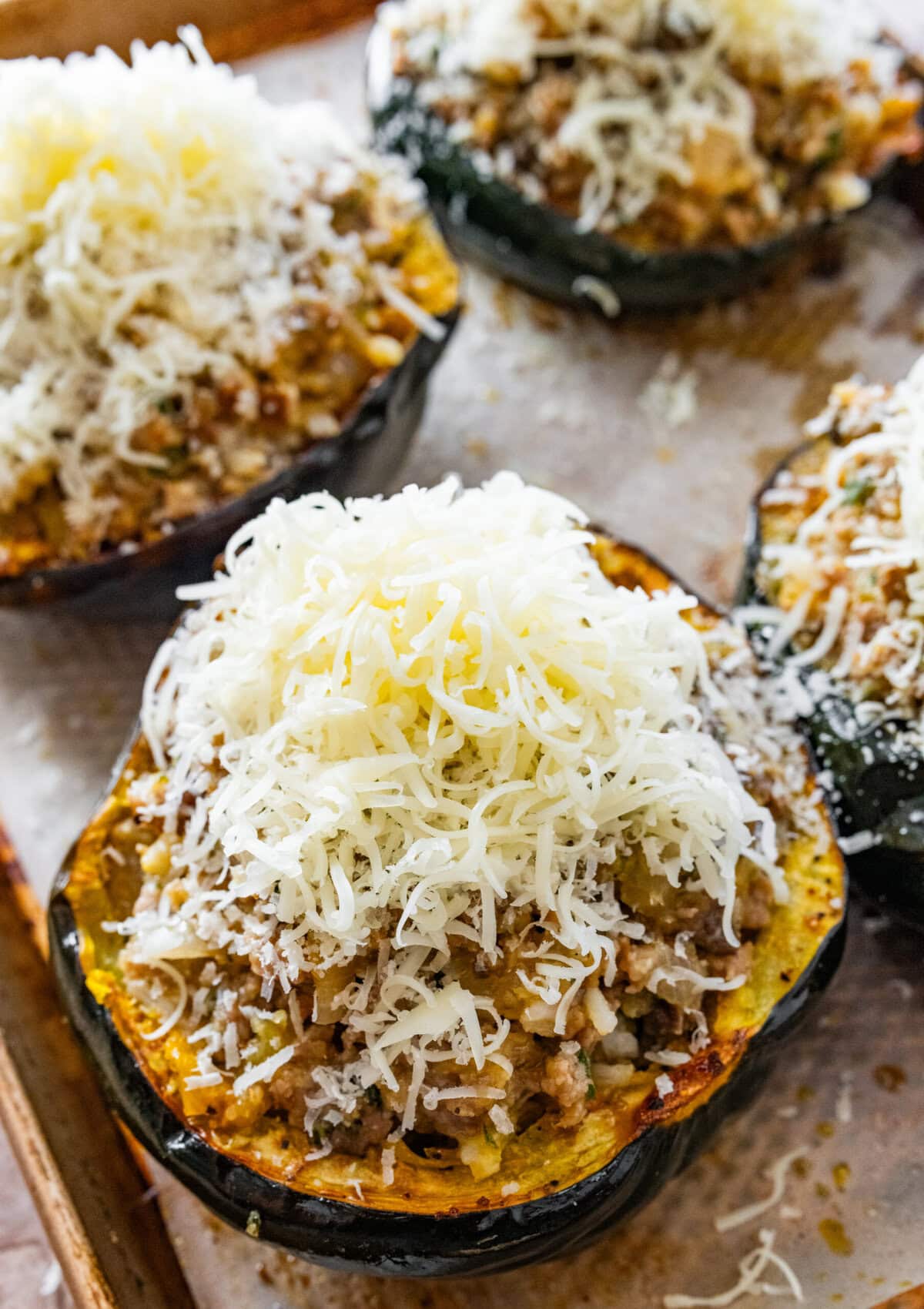 cheese on top of the stuffed acorn squash.