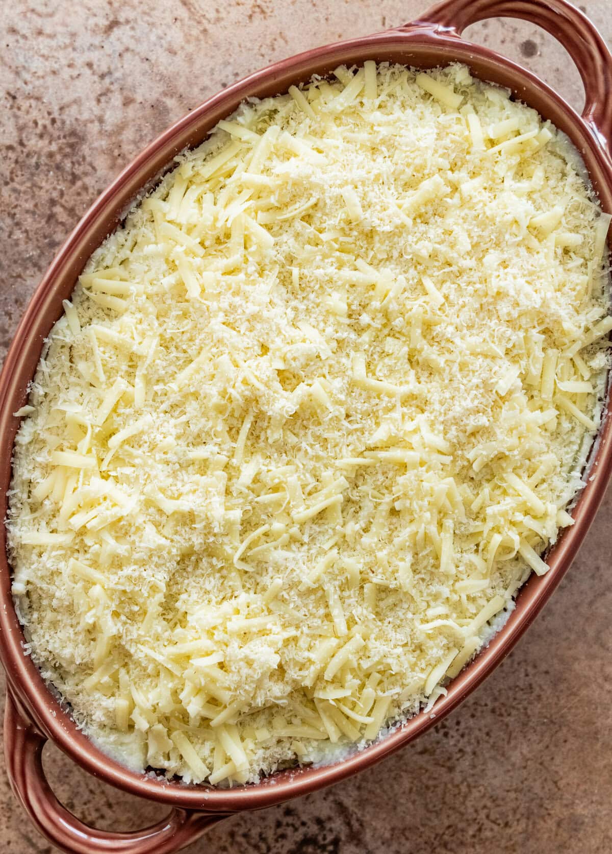 Add cheese to the top of the shepards pie before baking.