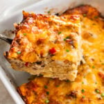 spatula lifting a square from the hashbrown breakfast casserole.