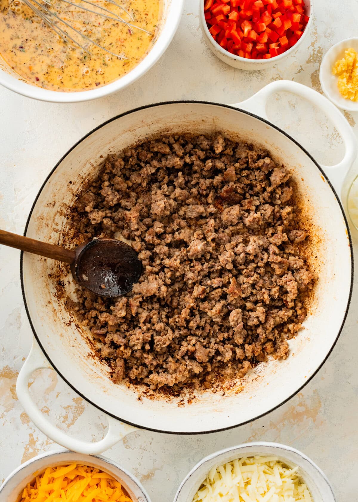 brown the sausage in a pan.