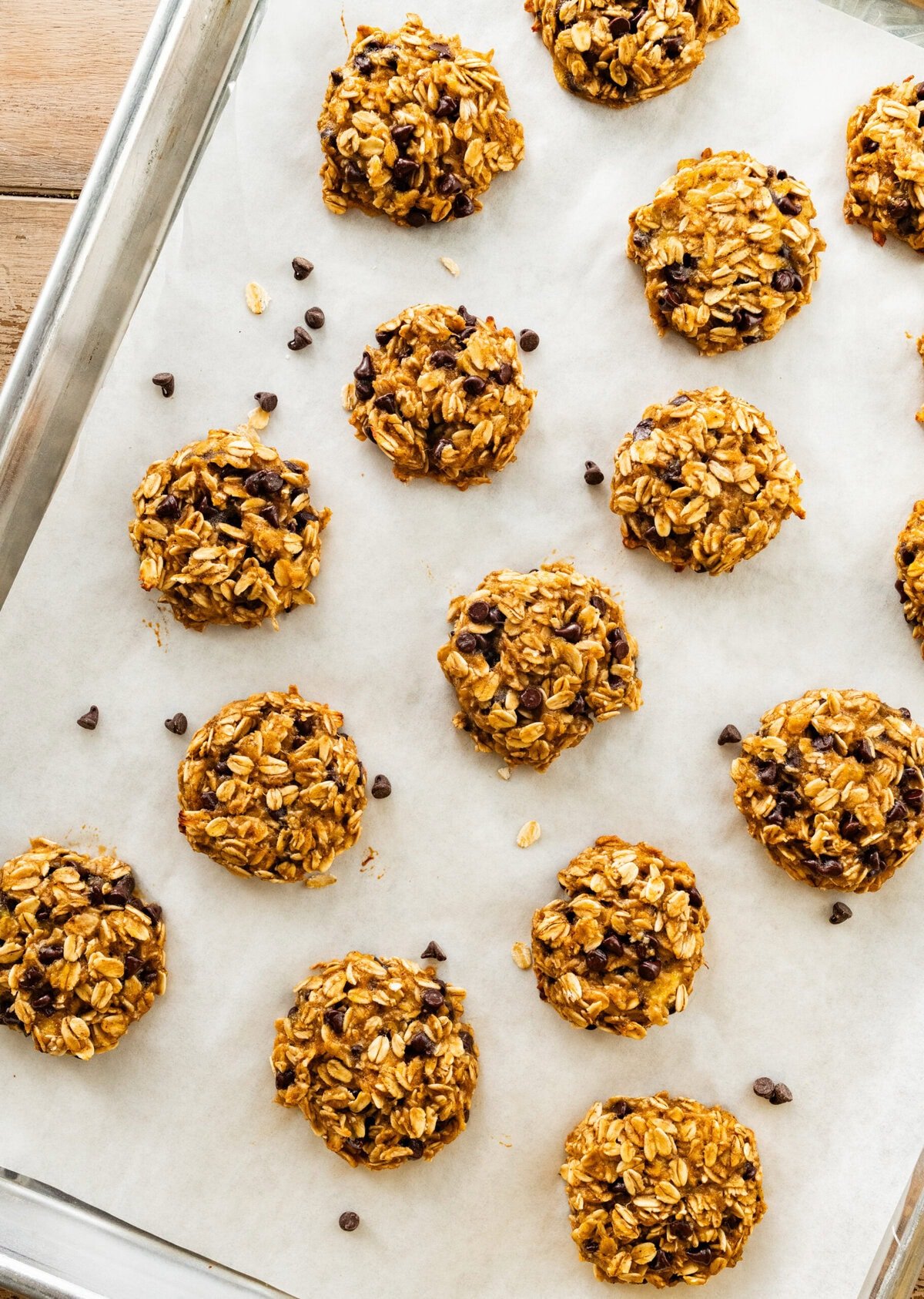 baked cookies on a cookie sheet with parchment.