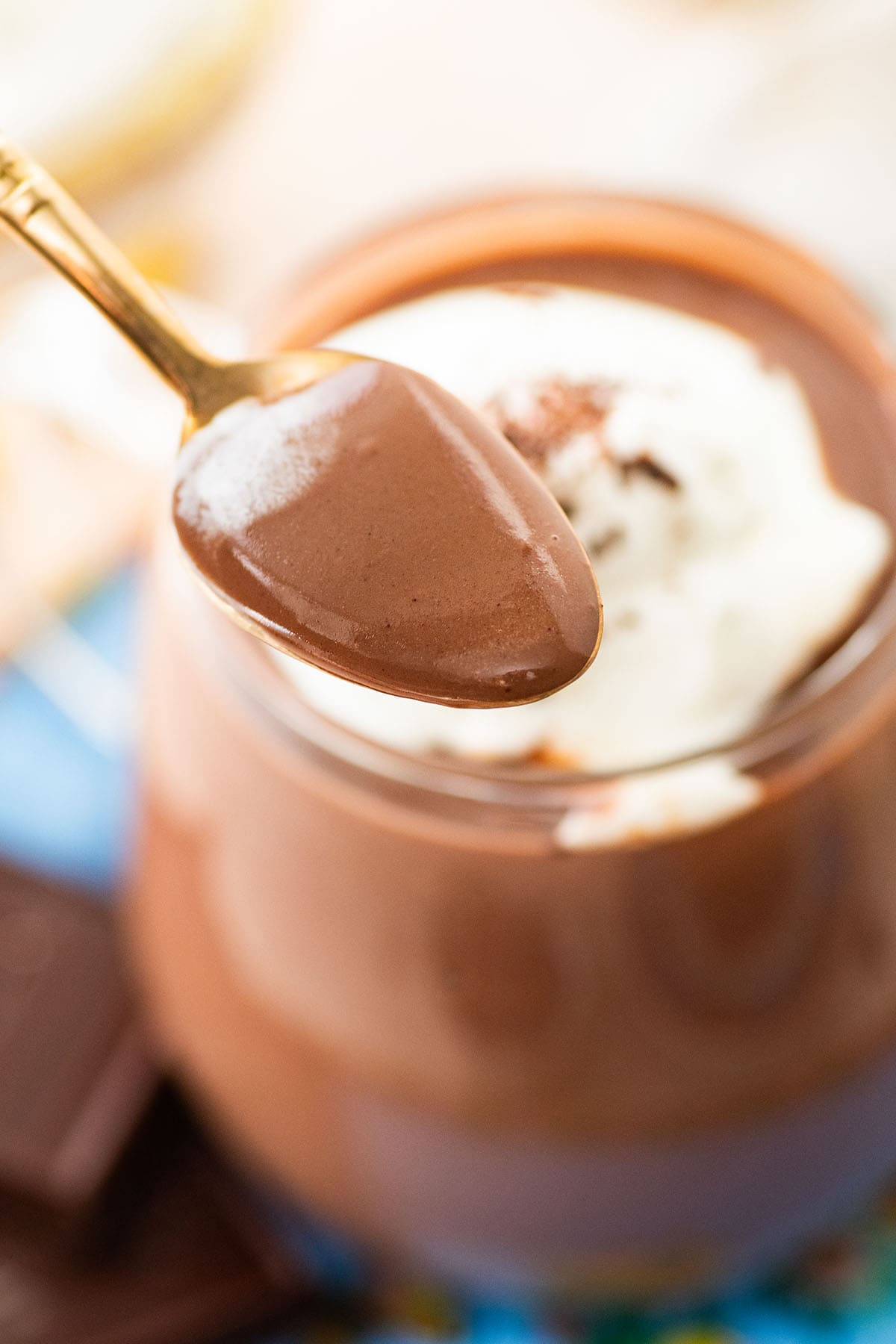 holding a spoonful of thick Italian hot chocolate.