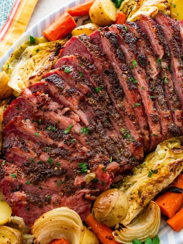 Sliced Baked Corn Beef and Cabbage on a serving tray.