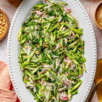 Asparagus salad on a serving dish before adding the dressing.