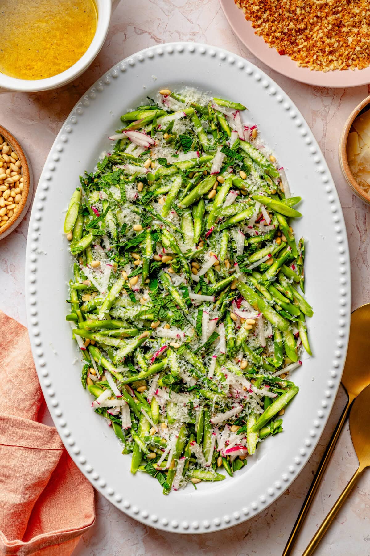 Asparagus salad on a serving dish before adding the dressing.