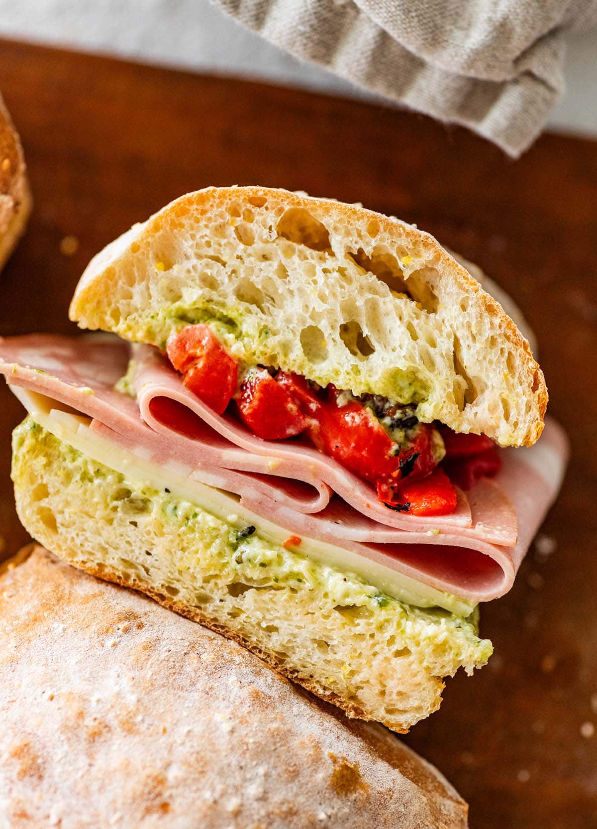 ciabatta used in a sandwich filled with meat and veggies.