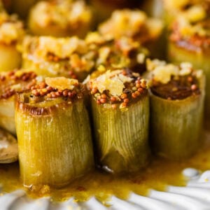 Braised leeks on a serving dish.