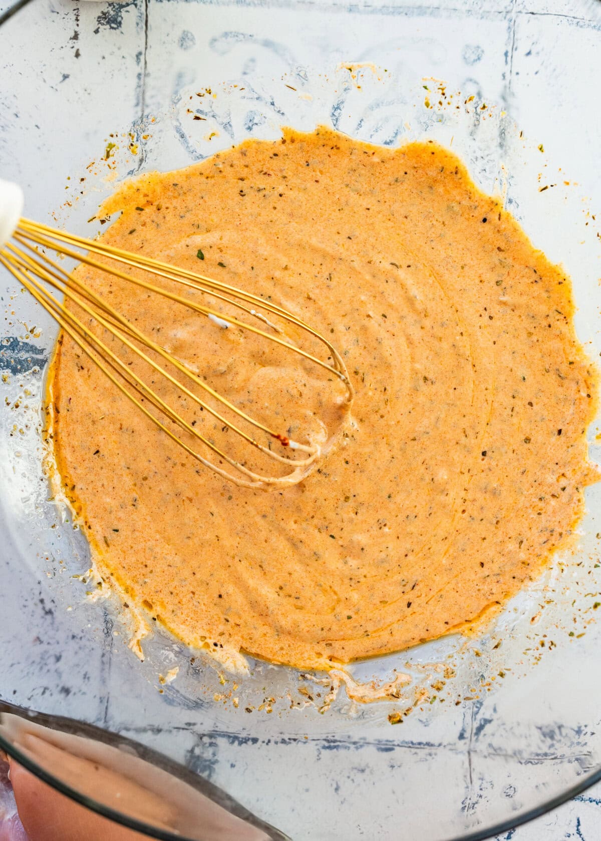 Chicken marinade in a bowl after whisking.
