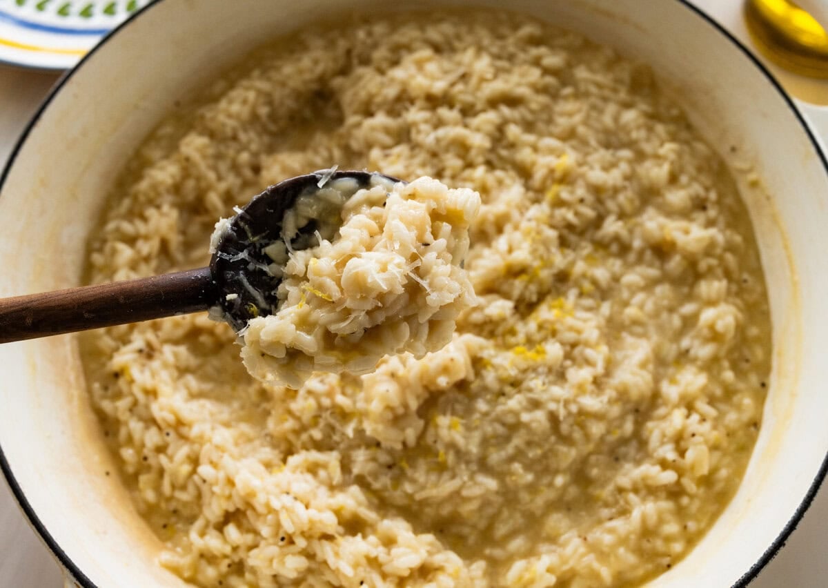 Risotto in pot after stirring ingredients together.