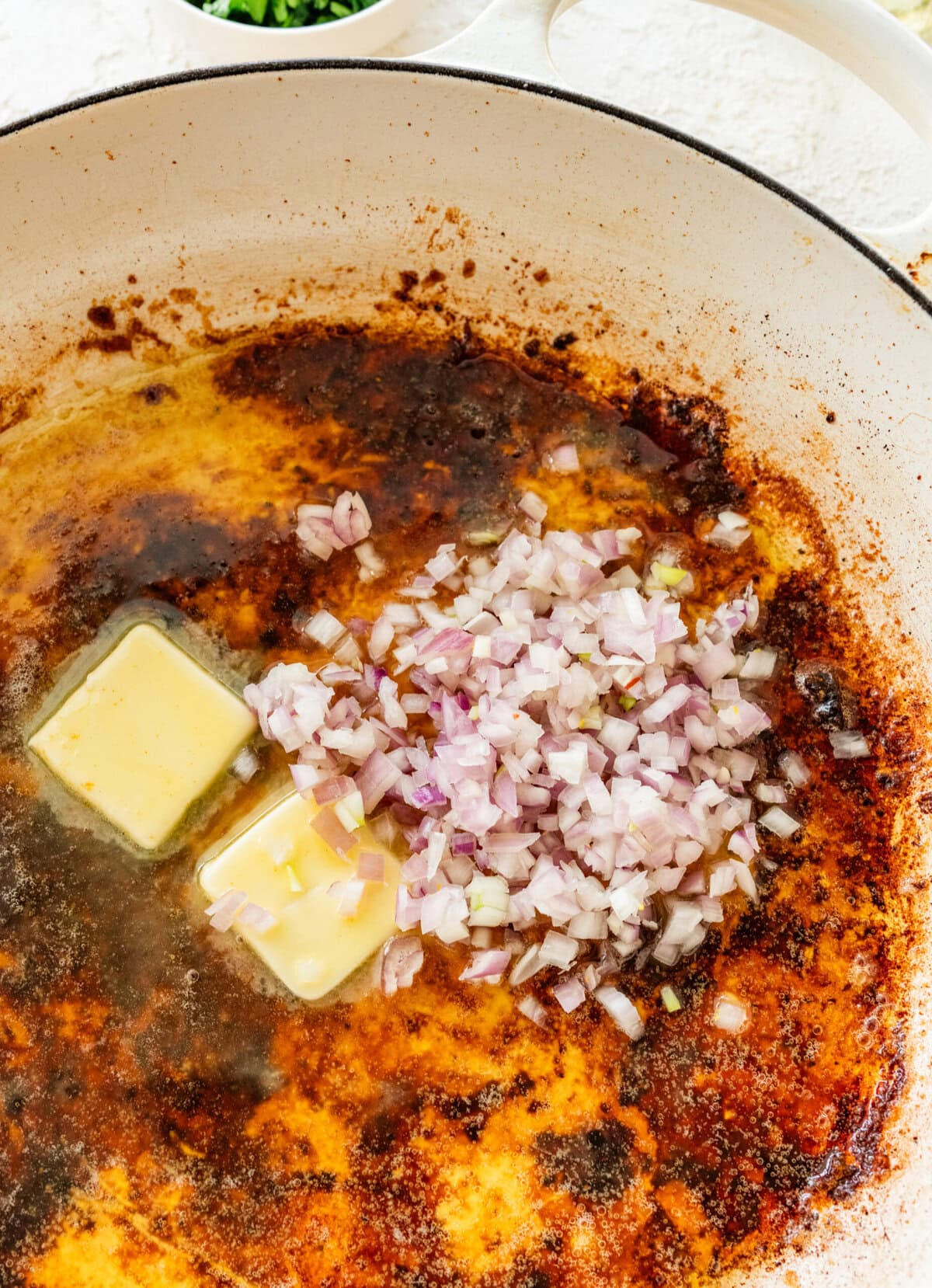 Butter and shallot added to the skillet.