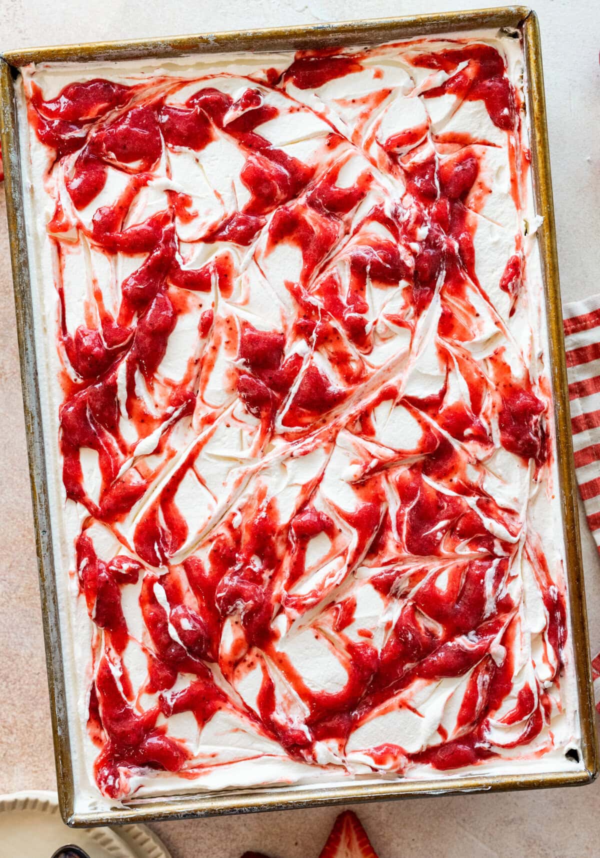strawberry puree swirled on top of the cake.