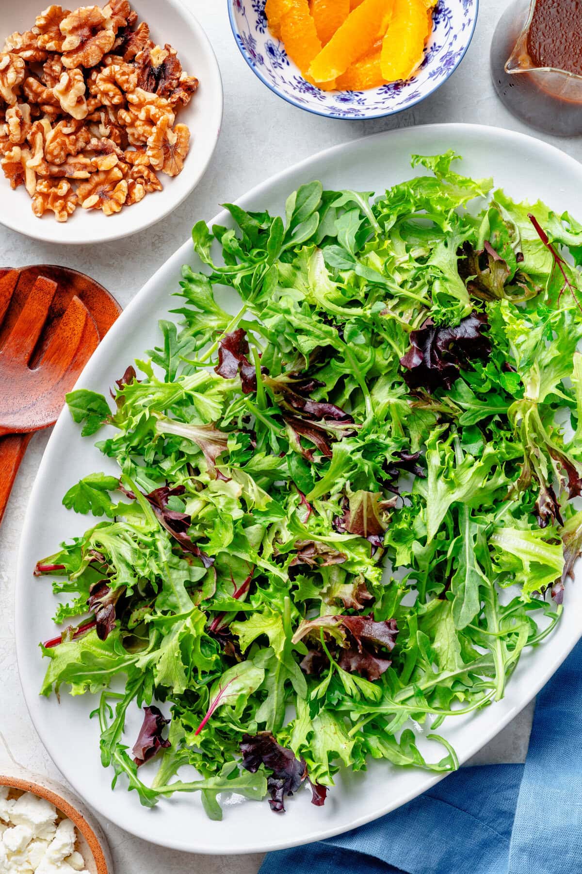 Greens added to a serving plate.