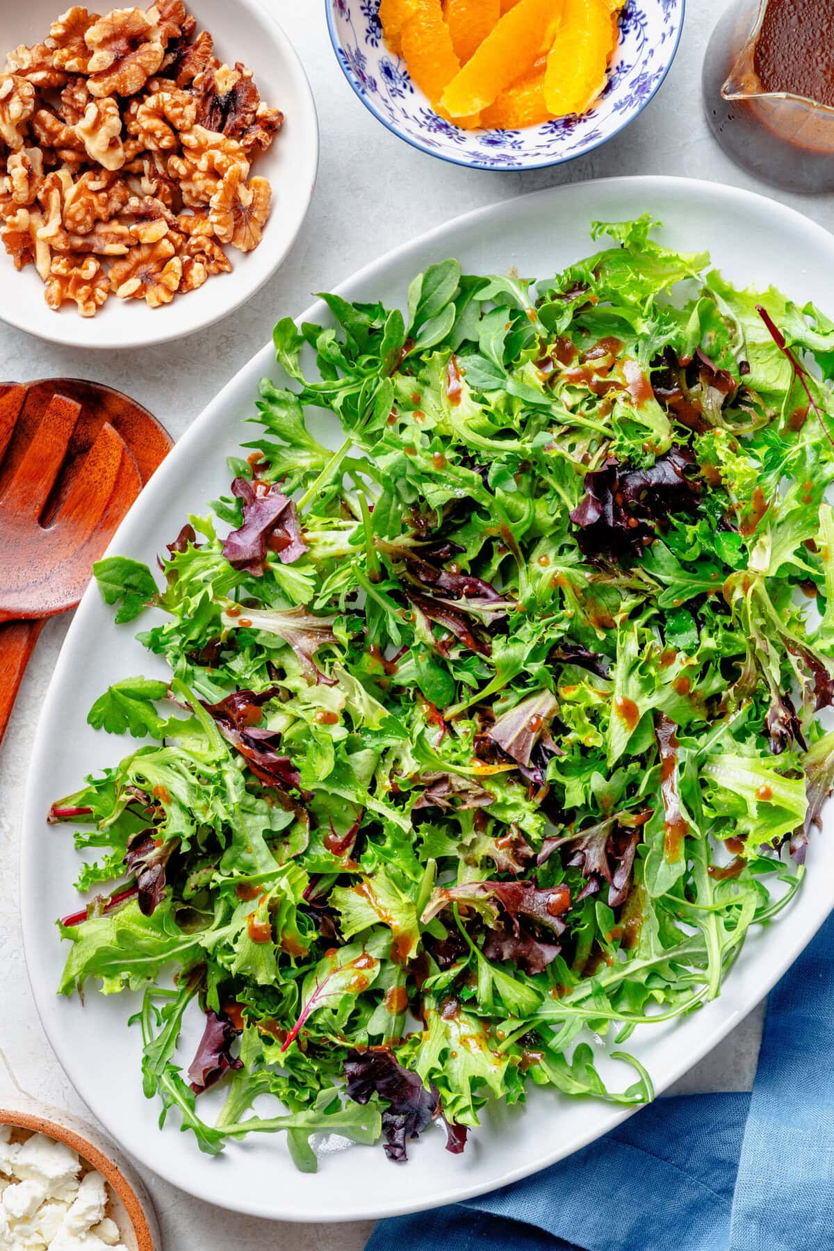 Greens added to a serving plate.