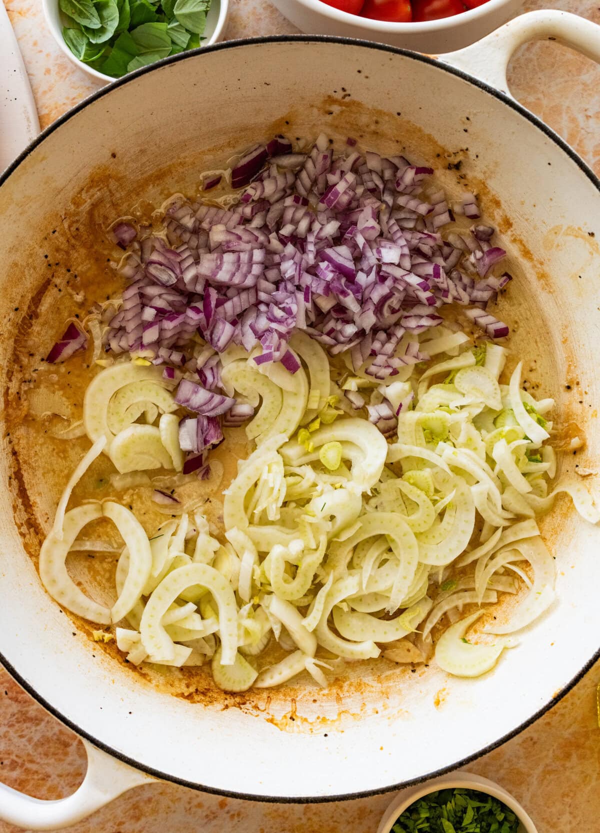 Onion and fennel in the same skillet that the fish was removed from.