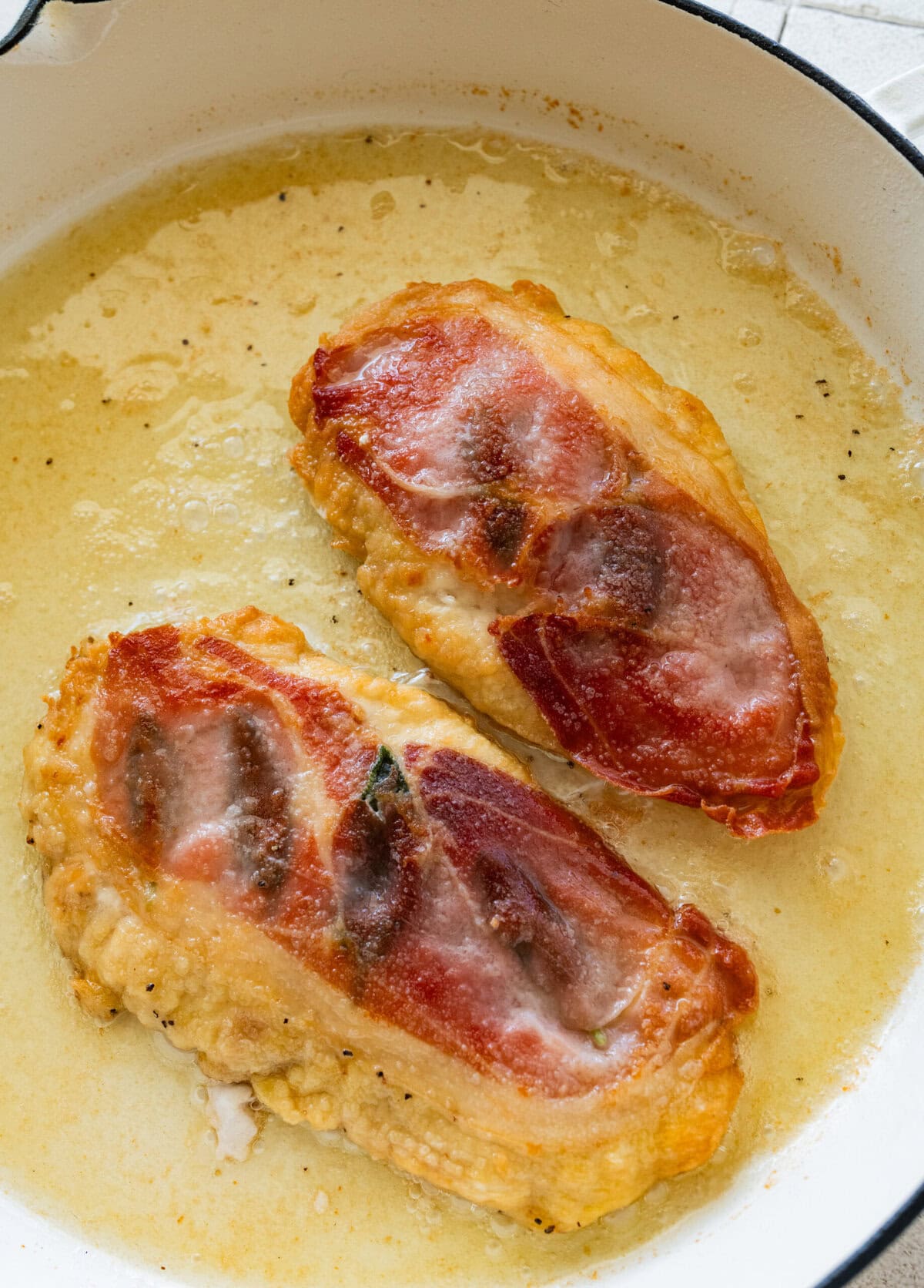 chicken flipped in the pan.