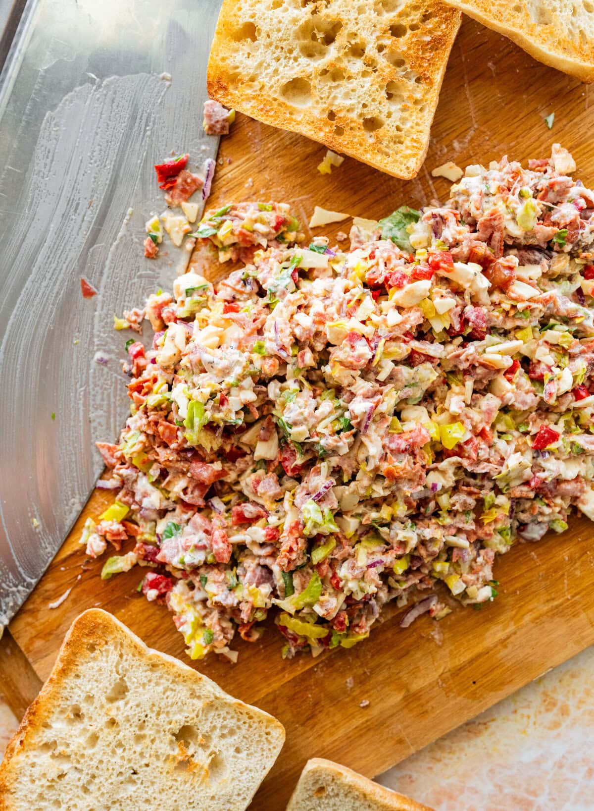 the sandwich mixture after fully combining and chopping together, resting on the cutting board.