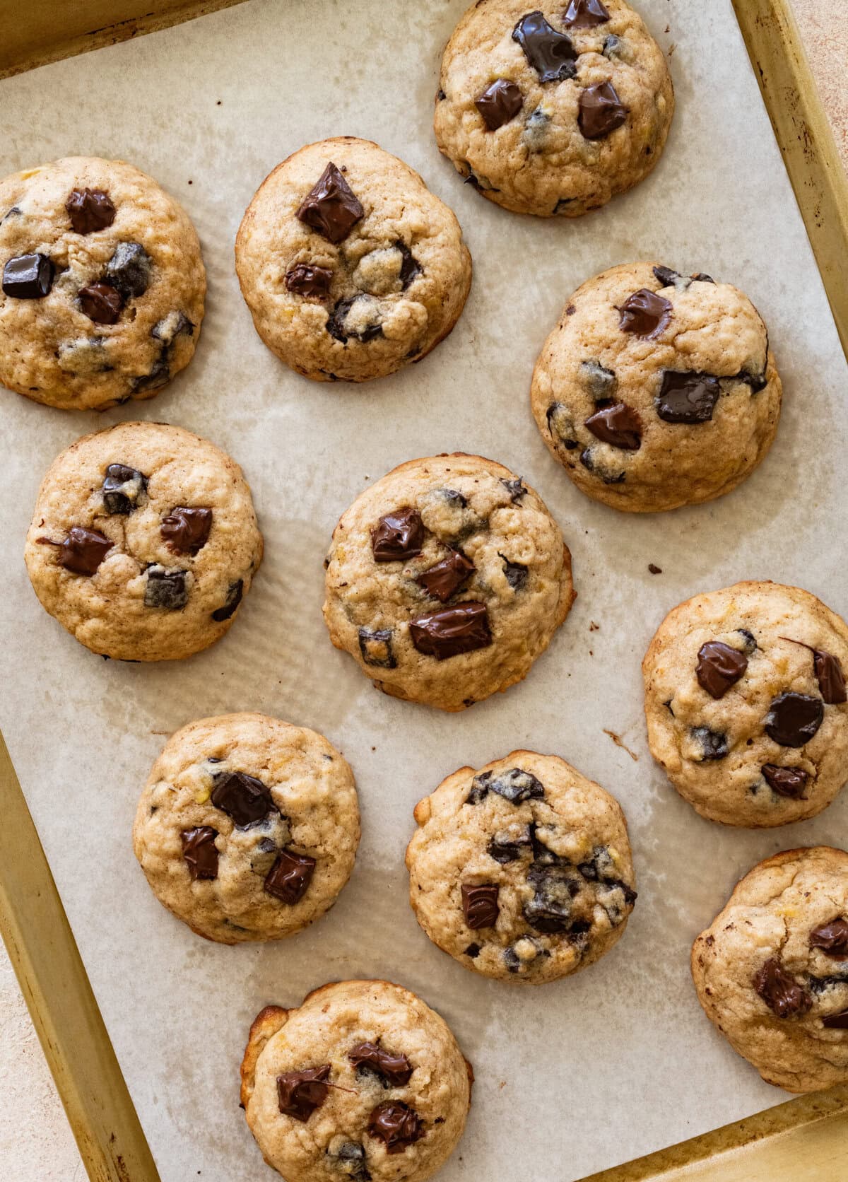 Banana bread cookies on a baking sheet after baking.