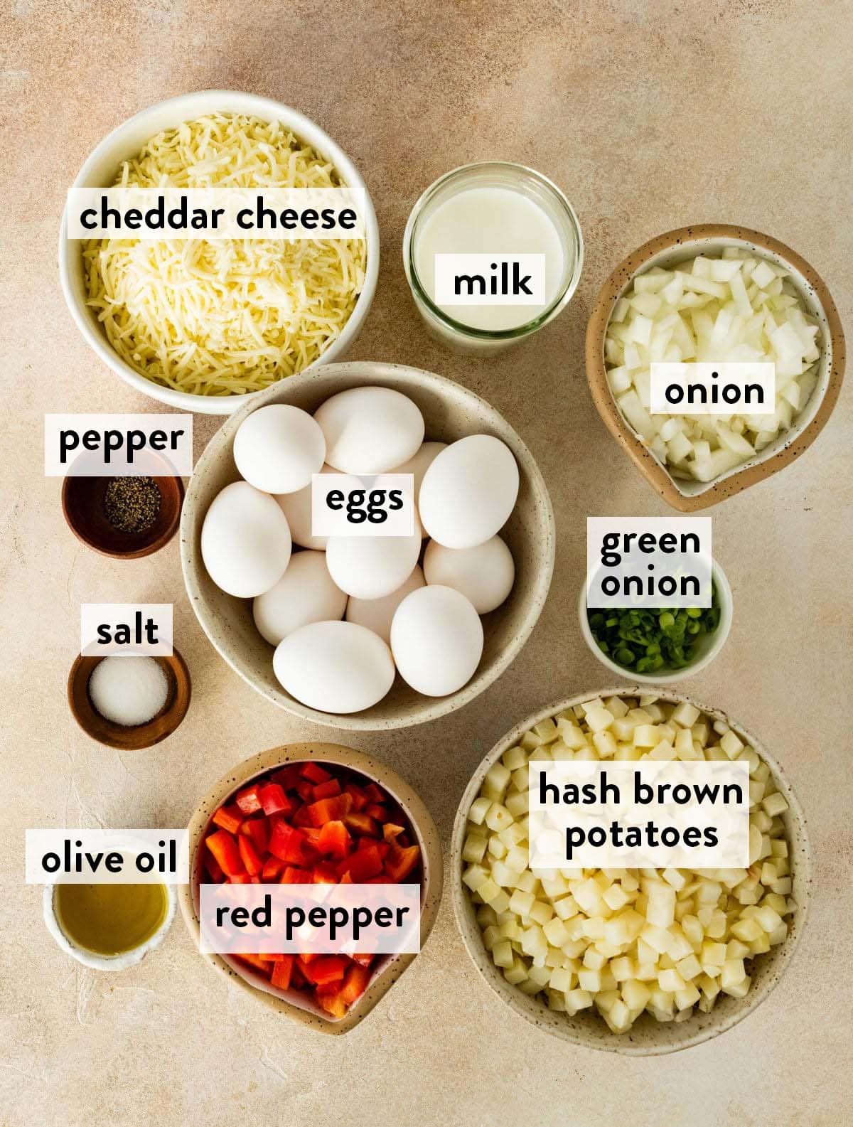 bowls of ingredients for hash brown breakfast casserole.