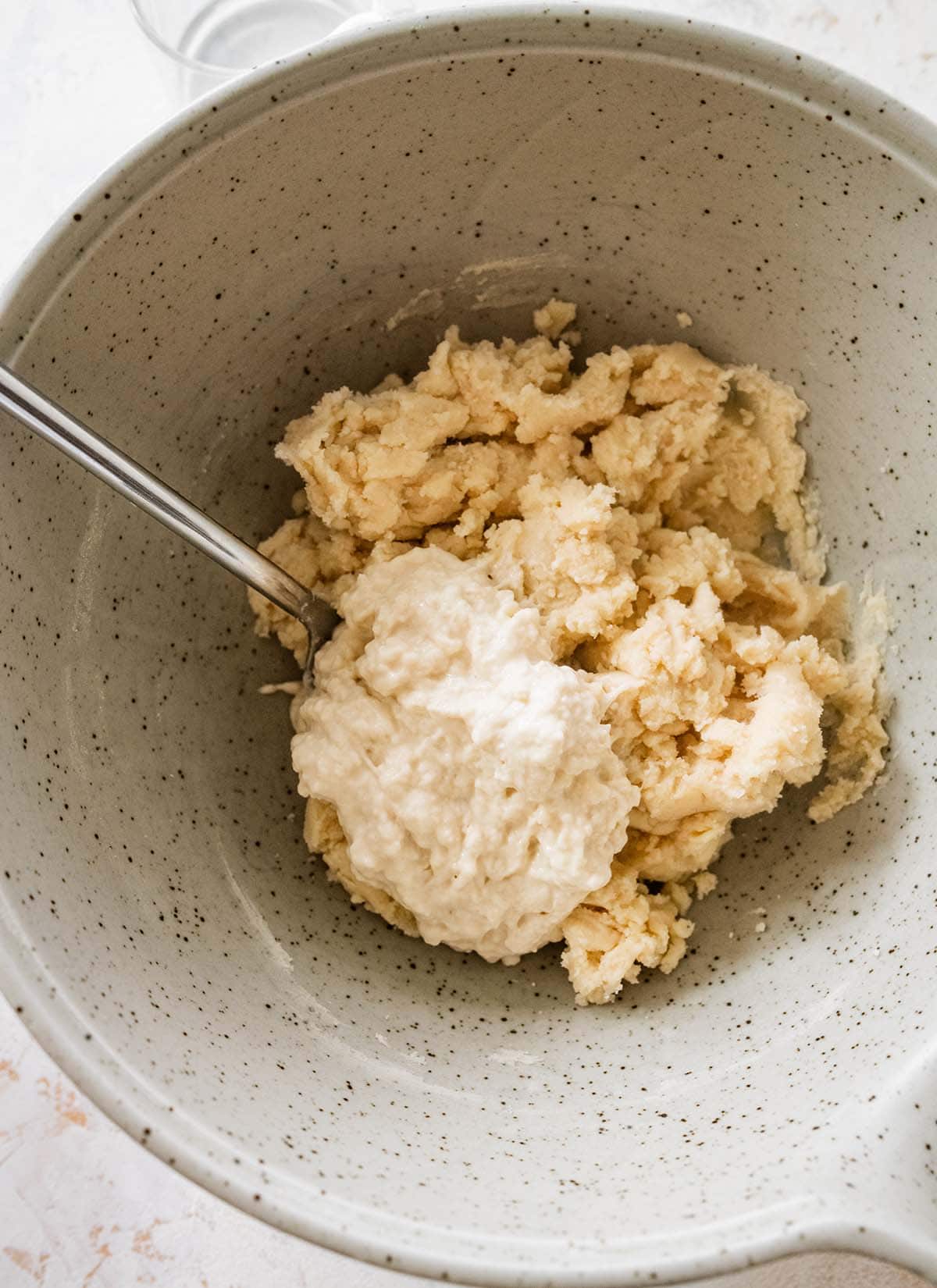 mixing pastry dough with a fork.